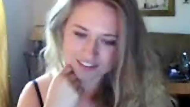 Busty blonde sucking dildo