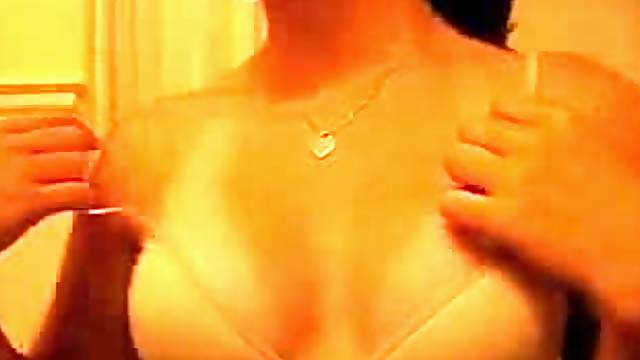 Perfect tittie bitch playing with her knockers here