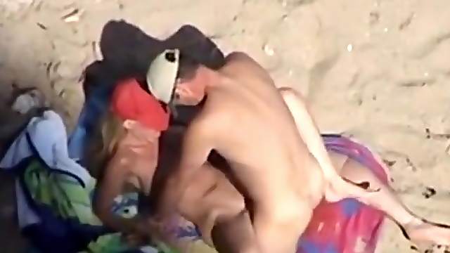 Horny blonde  babe having fun on the beach