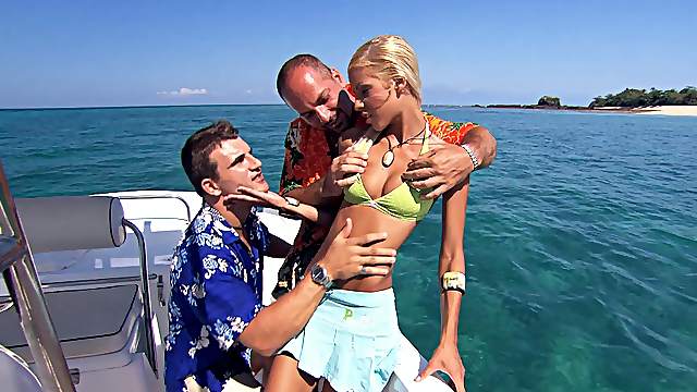 Blonde Boroka Bolls knows how to please two dicks at the same time