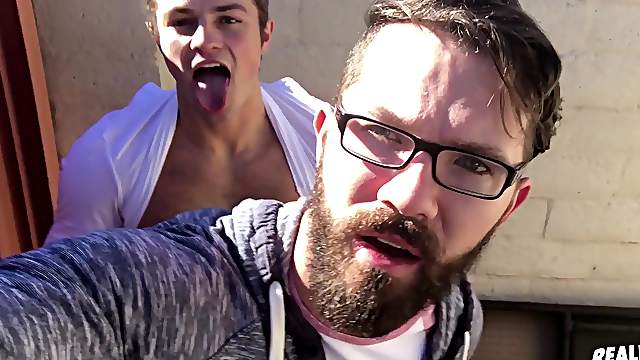 Nerdy gay hipster gets down on his knees to suck his friends dick