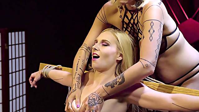 Blonde mistress enjoys fingering a friend while she moans