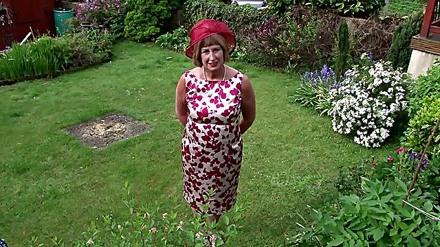 Mature granny Rosemary strips outdoors and plays with a dildo