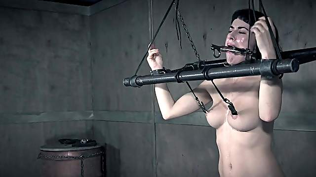 Brunette short haired slut Olive Glass tortured in hardcore bondage