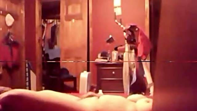 My wife watches porn on her mobile, while she fingers her pussy.