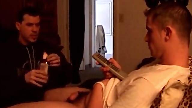Straight boy Marshall chills on the bed, as Vinnie prepares his dick for servicing.