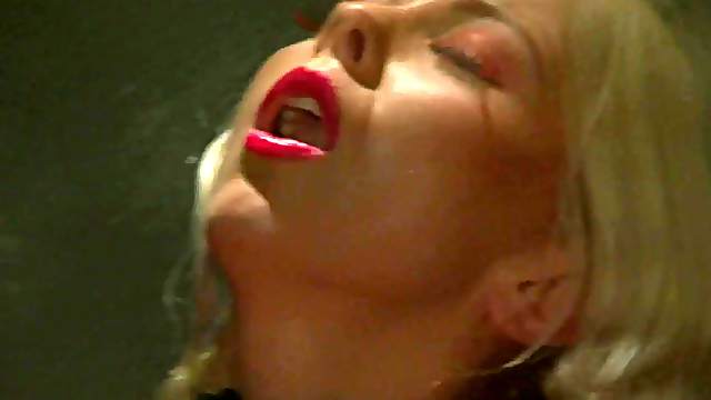 Lea Tyron wears sexy red lingerie for the masturbation with her fingers