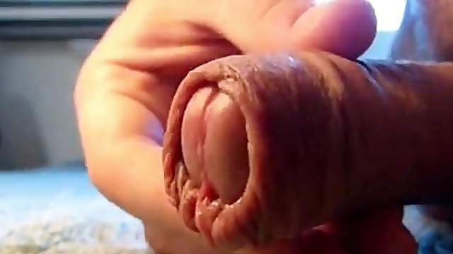 a close-up video of me playing with my foreskin.