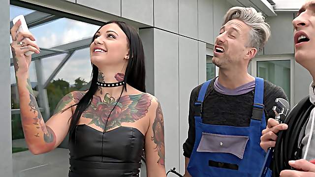 Tattooed Adel Asanty dresses up to have a MMF threesome sex