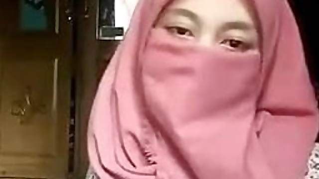 Hijab Muslim girl undressing