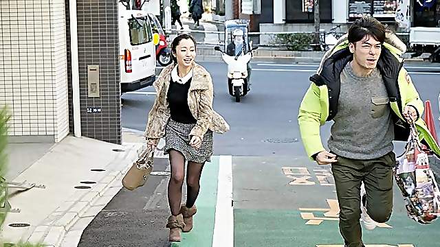 Satisfied beautiful Japanese woman with fingers and tongue