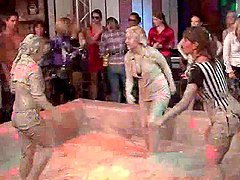 Hot lesbos show their mud covered bodies at a sex party