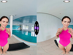 Glam teen Vixi Rafi poses by the pool in lingerie