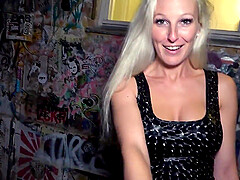 A girl with long hair has sex right in the car outdoors