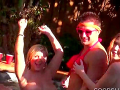 Hot blonde gets pussy pounded at a pool sex party