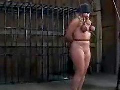 Slave Dia Zerva is caged and tortured by her lesbian master