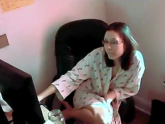 Nerdy girl in glasses watches porn and then gives a blowjob