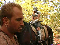 An armored babe comes across a stud in the woods that she fucks