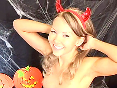 Naughty blonde dressed like a devil ass fucks herself with a toy