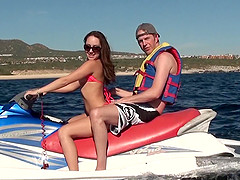 Impressive babe in enticing bikini giving big cock rousing blowjob