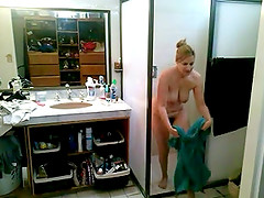 Hidden cam video with a cute blonde stroking her nice tits