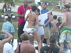 These shameless party girls aren't shy about pulling off their bikinis in public