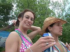 Amateur women wearing bikinis get caught on a cam at a party