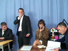 Two office colleges fuck their mature lady friend while in a office meeting