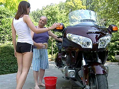 A much older guy gets to bang a teen slut by his motorcycle