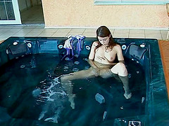 Alluring babe fondles her tits then fingers her coochie in the bath tub