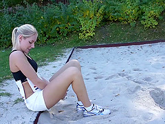 She drops her runner shorts to finger her tight cunt