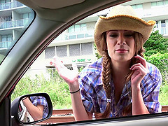 Cowgirl gets in the car and slobbers all over his dick