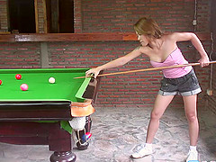 Tattooed babe please s her craving as she seductively strips by the pool table