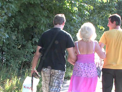 Granny and a couple of college guys have a threesome in the woods