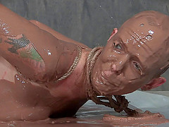 Saucy bald slut gets restrained in a kinky BDSM session