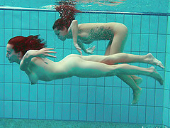Curvaceous Russian senoritas taking an erotic bath in the pool