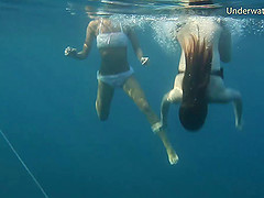 Lustful babes enjoy showing off their bodies underwater