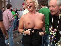Blonde with a big pair of tits is acting naughty with her friends