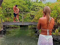 Alexandra Silk has a fun time being plowed on a bridge