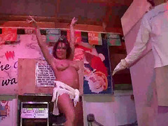 Group of babes having a wet t shirt contest at the club