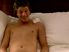 Hung young man Tyler Brody caresses his thick pecker in bed