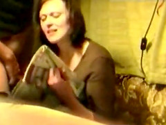 Сhubby brunette milf giving some guy head without any idea she is being filmed.