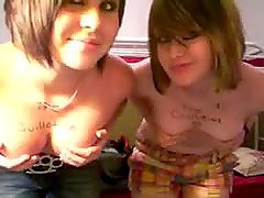 Two kinky emo sluts showing off their nice titties