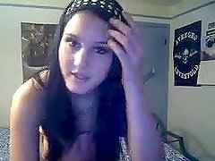 Lovely brunette girl getting totally naked