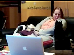 She masturbates over het track pants with our cat as spectator.