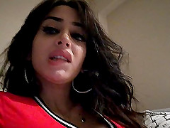 attractive black hair bomb likes to show her body and face to the camera