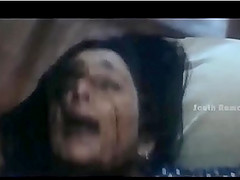 Kinky brunette girl screams loudly while she's laying on the bed