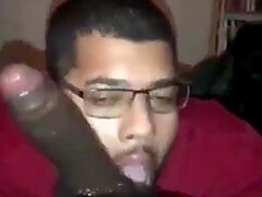 Gobbler sucks a big black cock like a pro