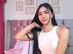 Beautiful long haired brunette Latina amateur teen with spreaded legs in bed