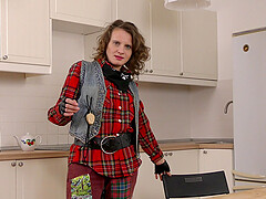 Princess Mustang loves pleasuring her hairy pussy in the kitchen